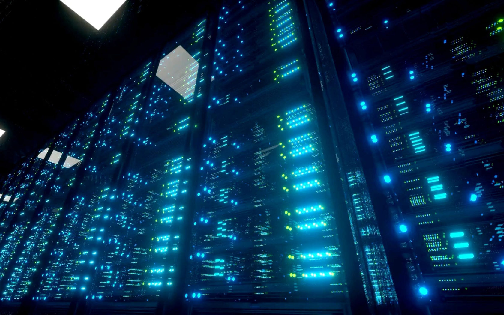 Blue lights lighting up a server rack, shot from a low angle.